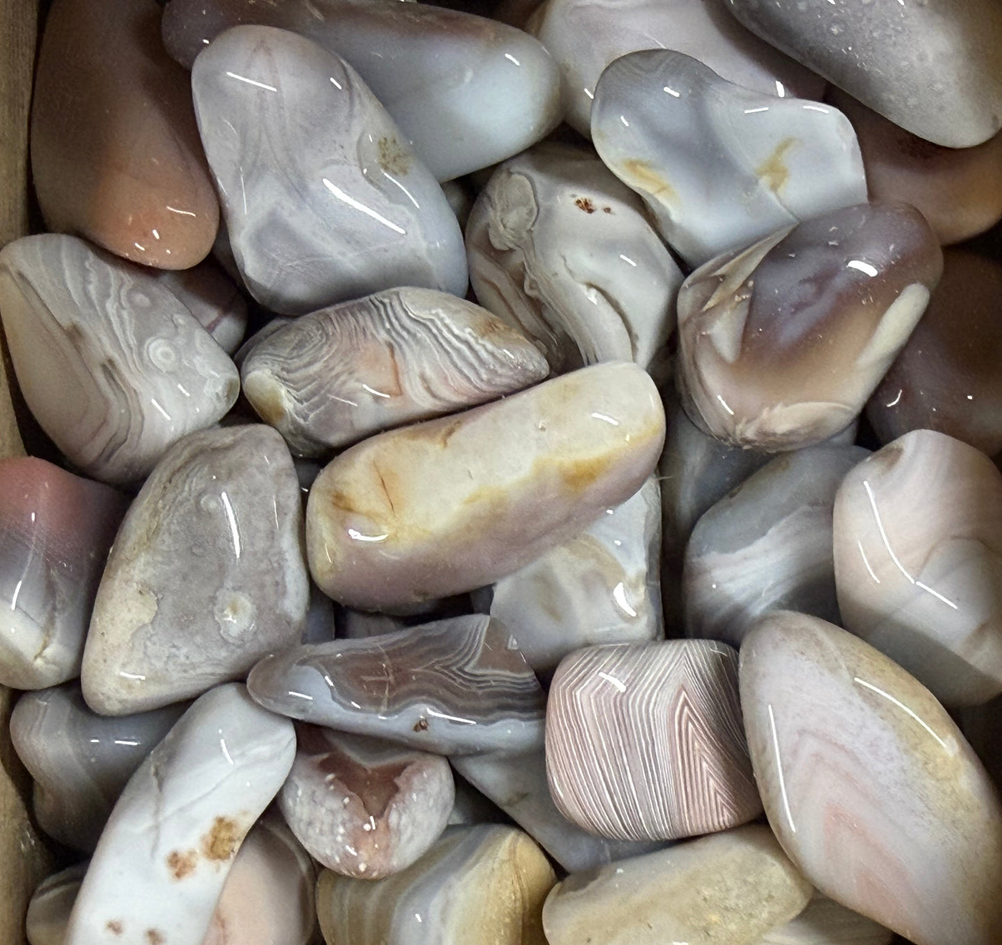 pink botswana agate tumbles