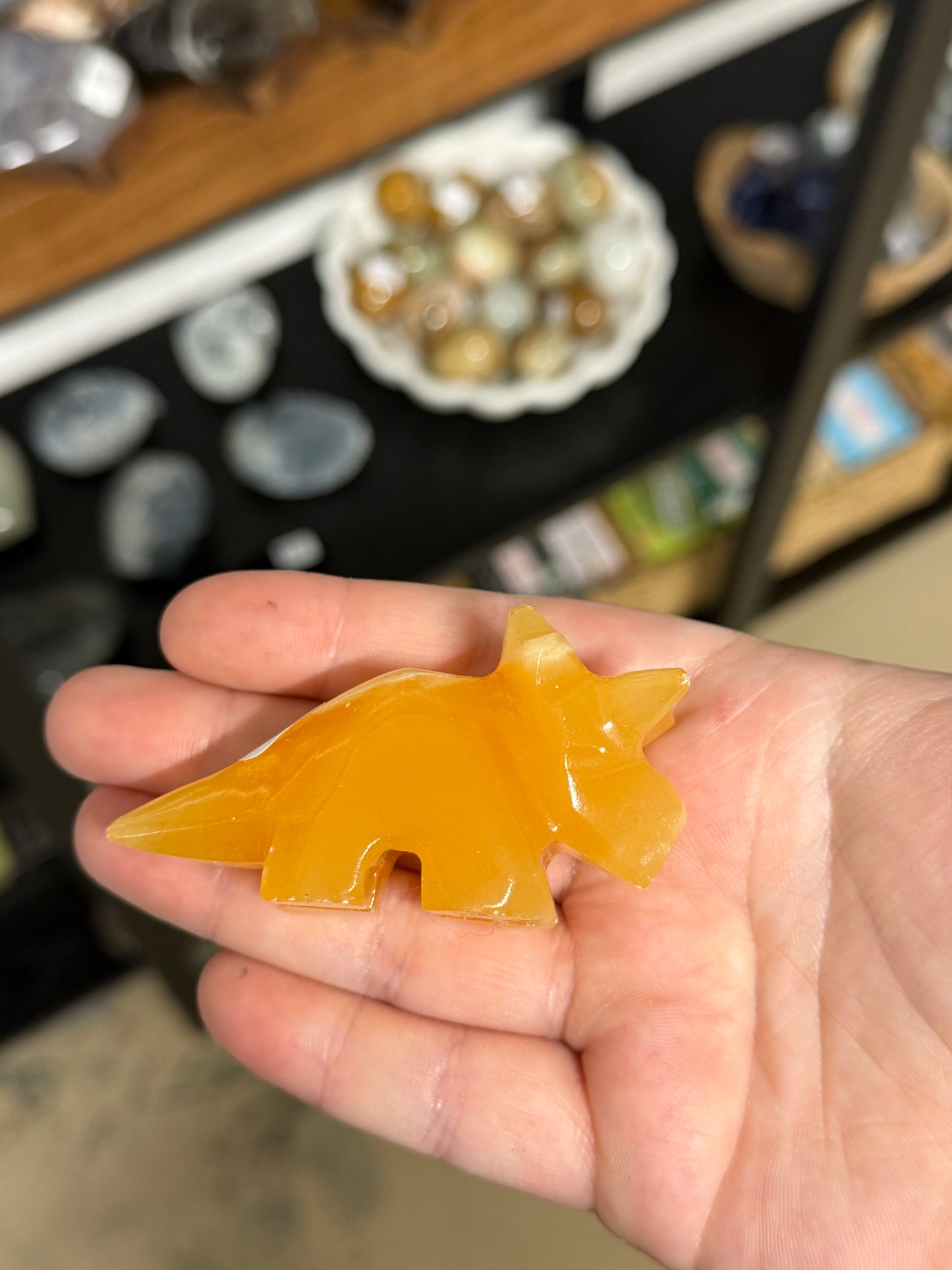 orange calcite mini dinosaur