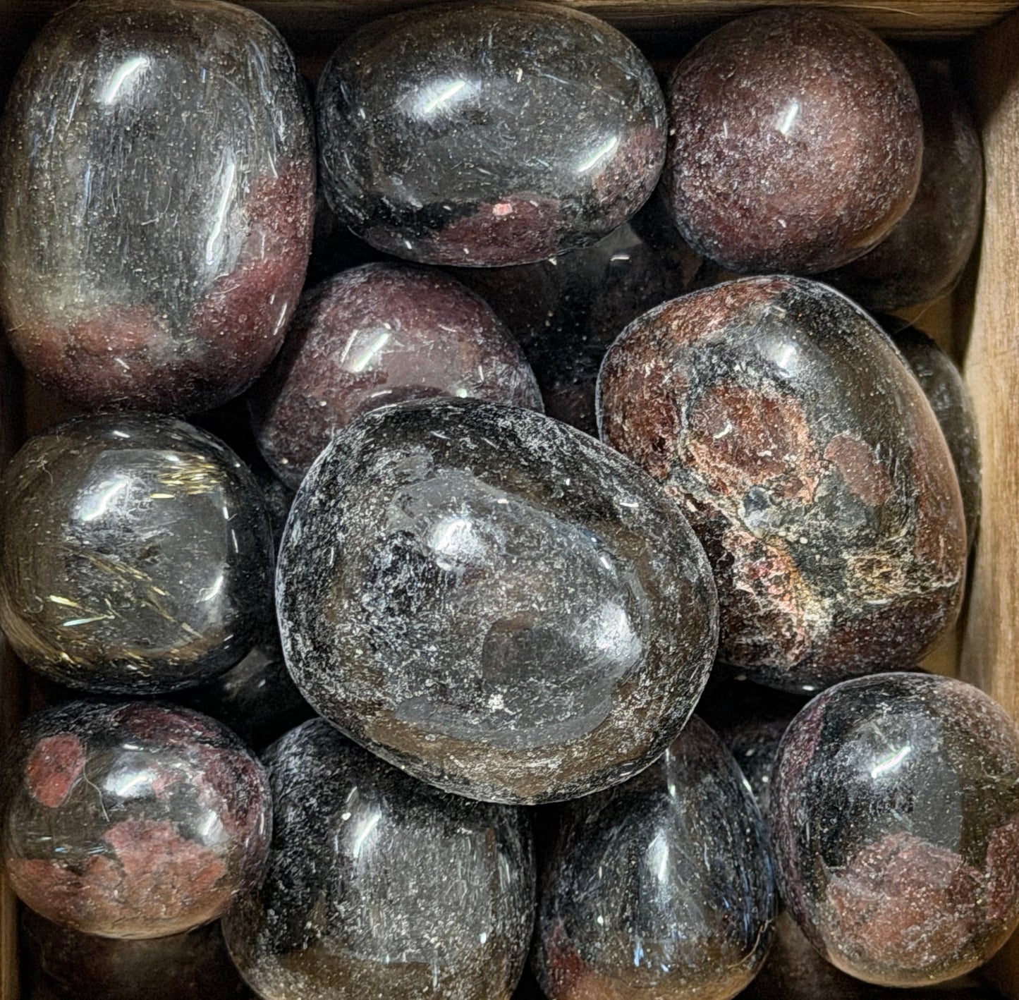 garnet and astrophyllite tumbles