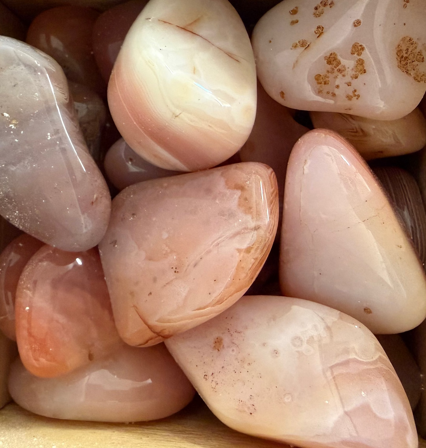 pink botswana agate tumbles