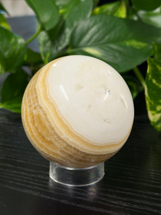 banded orange calcite sphere