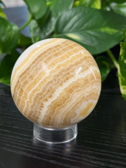 banded orange calcite sphere